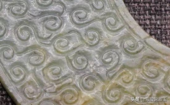 汉代玉璧 龙形玉佩的解析图