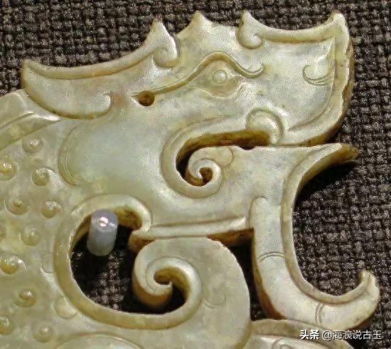 汉代玉璧 龙形玉佩的解析图