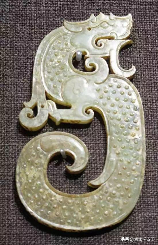 汉代玉璧 龙形玉佩的解析图