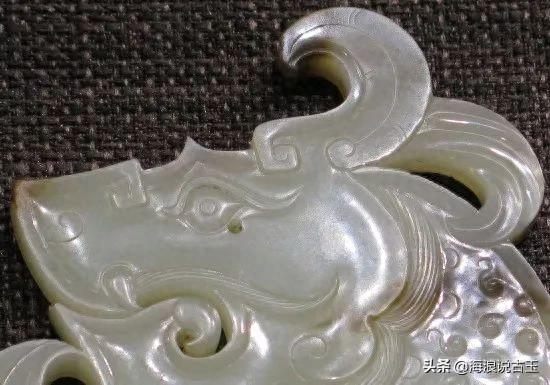 汉代玉璧 龙形玉佩的解析图