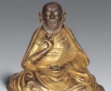 ​唐东杰布，六年级下册语文课本的第7课藏戏中的唐东杰布是个怎样的人？